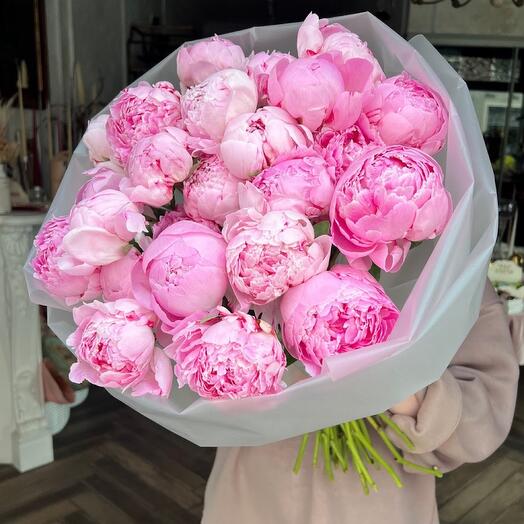 Bouquet of pink charming peonies