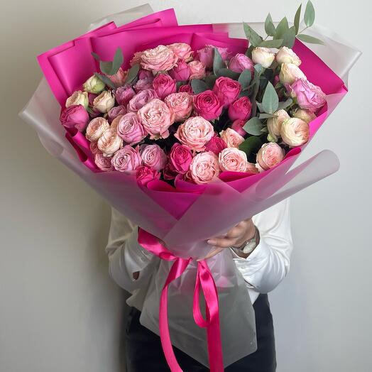 A mix of bush roses with eucalyptus