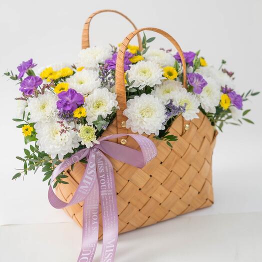 Field bag made of chrysanthemums and dianthuses