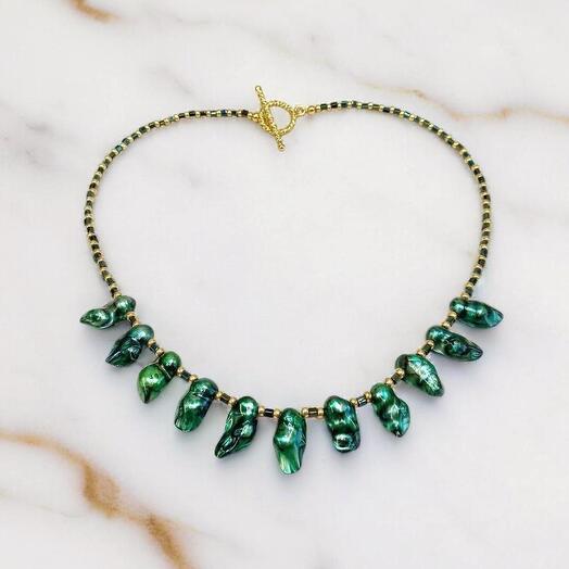 Green and gold pearl necklace