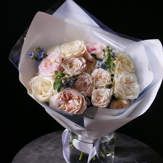 Bouquet with peony-shaped roses, astilba and oxypetalum