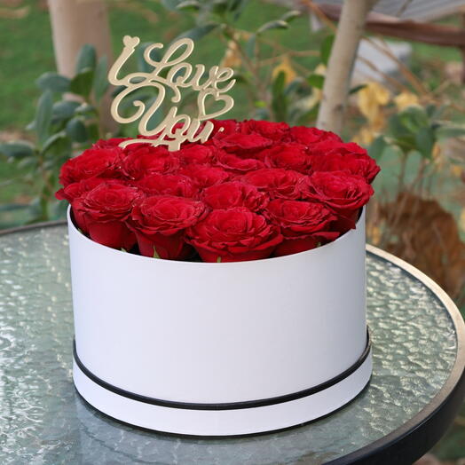 Red roses with white box