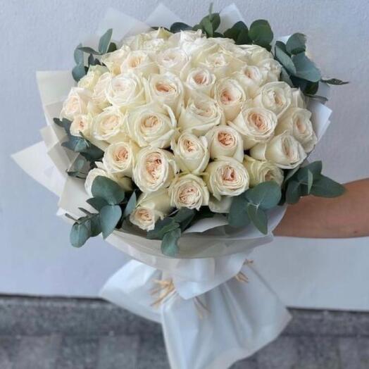 Bouquet of white peony roses and eucalyptus