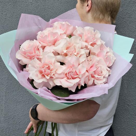 A delicate bouquet of French roses in a stylish package