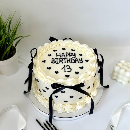 Birthday cake with frills and bows