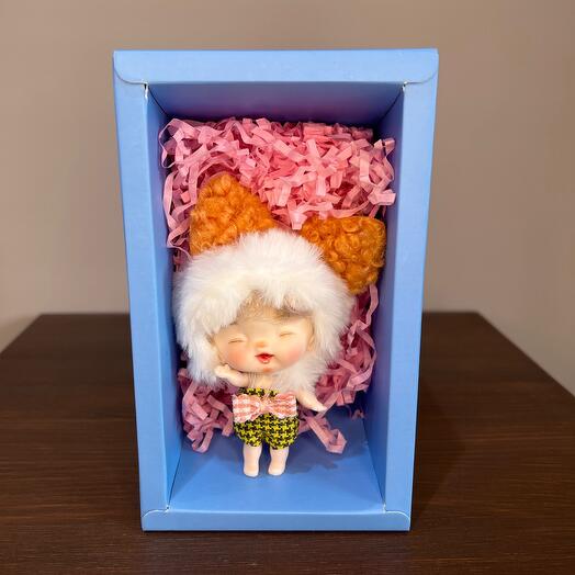 Игрушка коллекционная кукла малышка в голубой коробочке