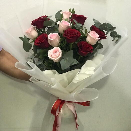 12 Stems red   white roses in a nice wrapping