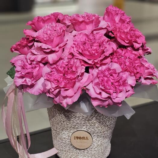 Pink roses in basket