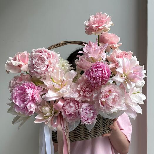 Fragrant basket with peonies, peony-shaped lilies and French roses