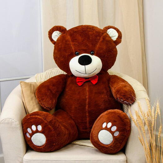 Коричневый медведь игрушка