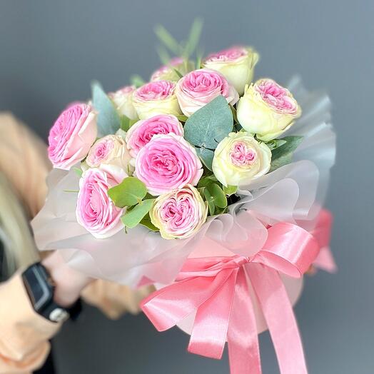 Box with peony-shaped roses and eucalyptus