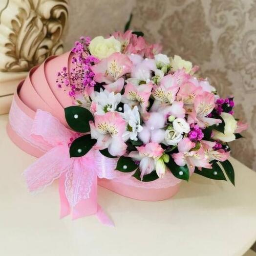 Flowers in a stroller for the discharge of a girl from the hospital