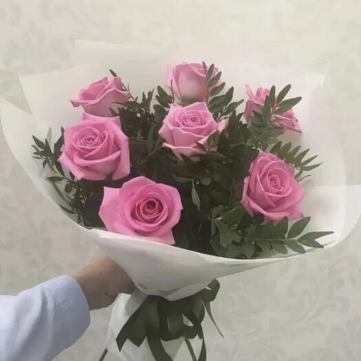 7 pink roses with greenery