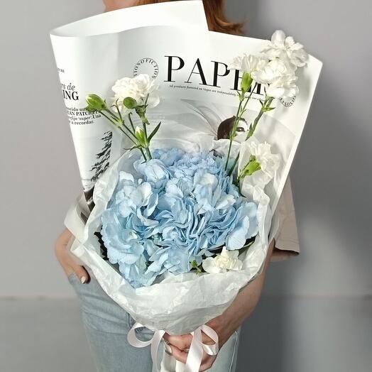 Bouquet of blue hydrangeas and white bush carnations