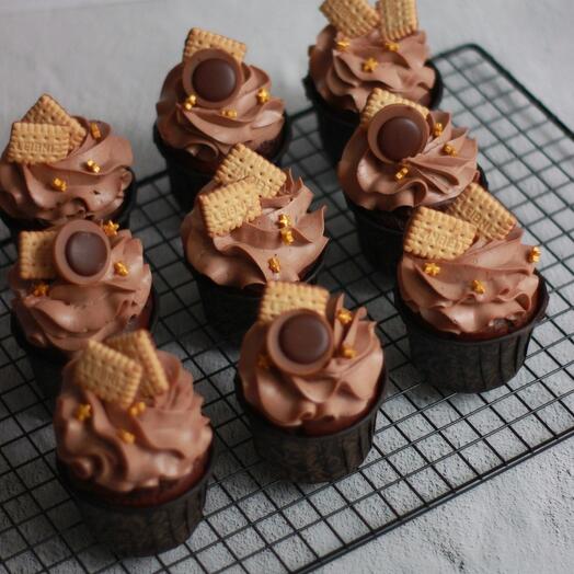 Chocolate cupcakes with caramel and nuts. Set of 9pcs