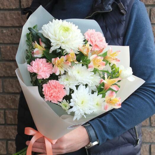 Delicate bouquet with persistent chrysanthemums, alstroemerias, carnations and fragrant freesia