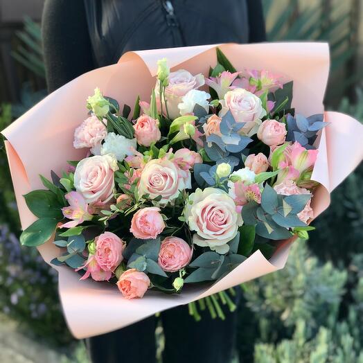 Bouquet of delicate pink peony-shaped roses, eustoma and alstroemeria