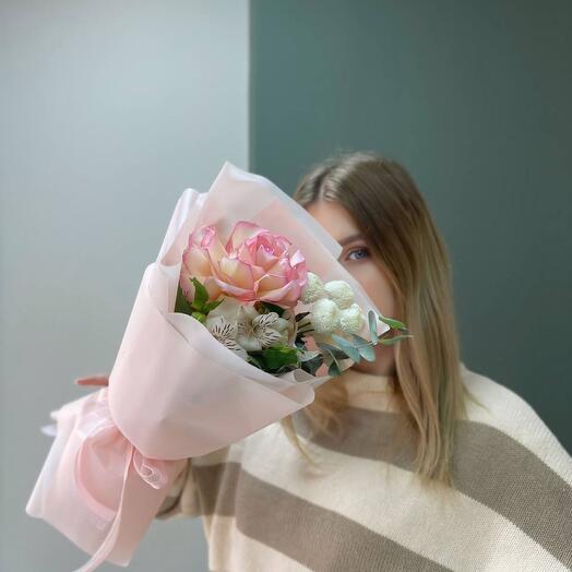 A compliment bouquet with a French rose