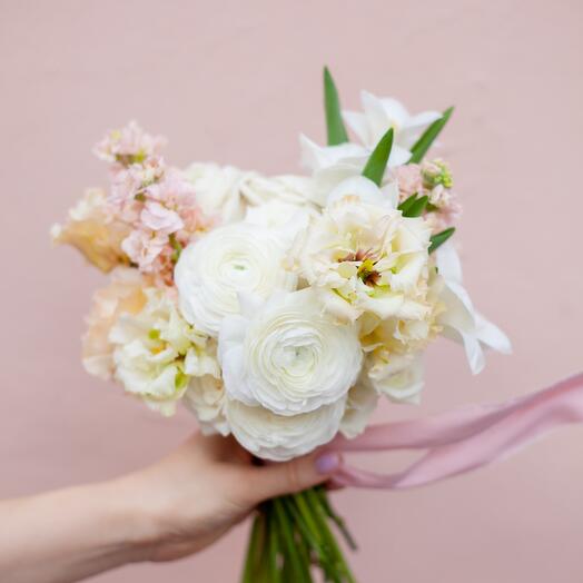 Wedding bouquet in white and peach color scheme