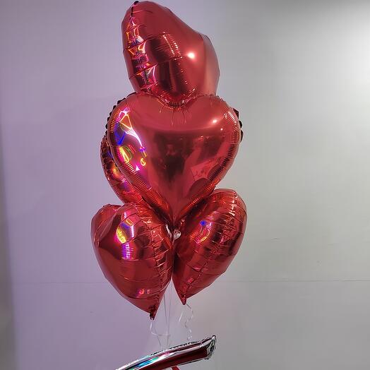 Червоні серця з фольгованим написом Love