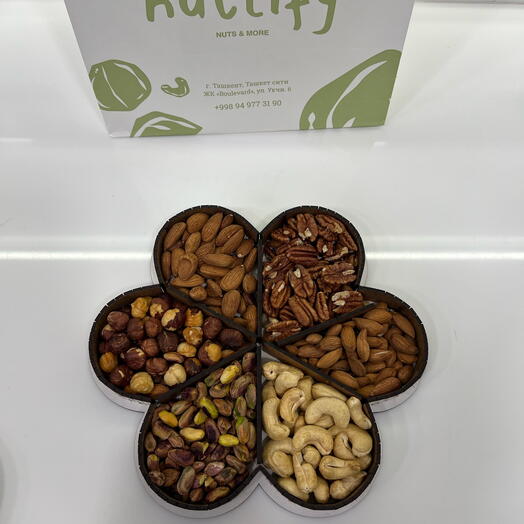 Set of nuts in wooden flower