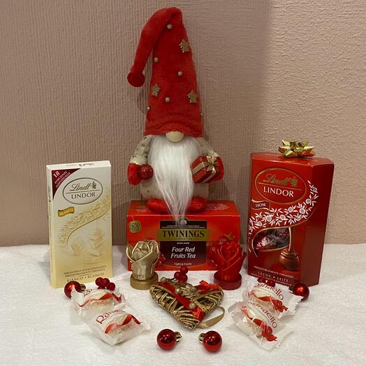 Caja de regalo roja y dorada con té