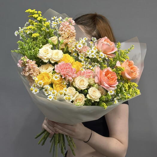 Bouquet with wildflowers and roses