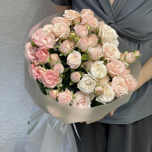 A bright bouquet of 15 bush roses