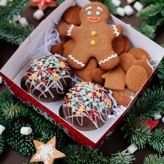 2 какао бомбочки для приготовления горячего шоколада и имбирные пряники