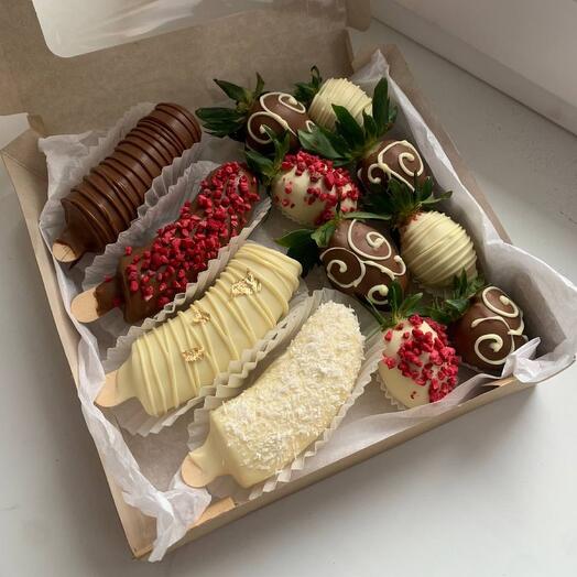 Assorted bananas and strawberries in chocolate