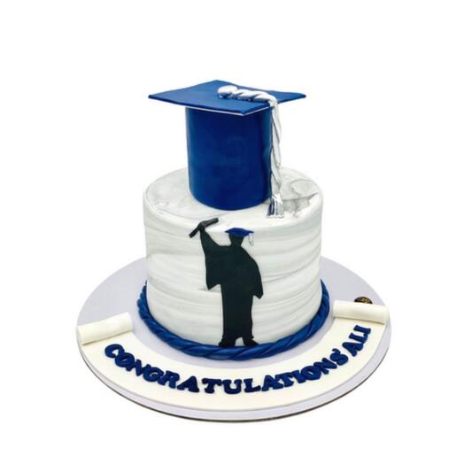 Graduation blue cap cake