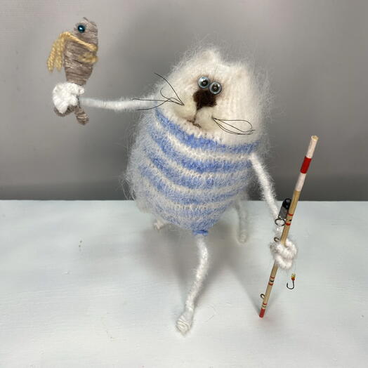 Котик с уловом