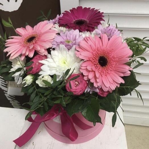 Flowers in a box are Gerberas, chrysanthemums and bush roses