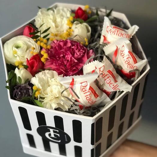 Seasonal flowers in a box with raffaels