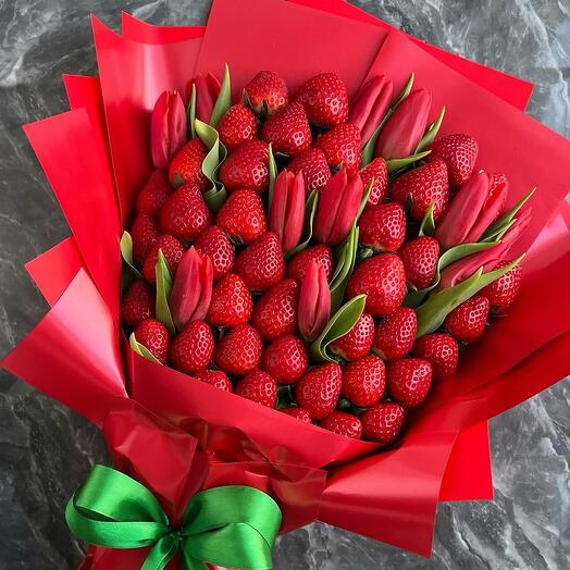 Bouquet of strawberries and tulips