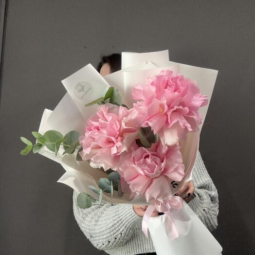 Bouquet of three French roses with fragrant eucalyptus