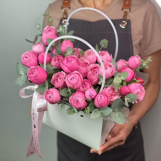 A basket with peony roses by Silva Pink