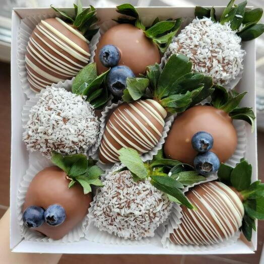 Strawberry chocolate with coconut decoration