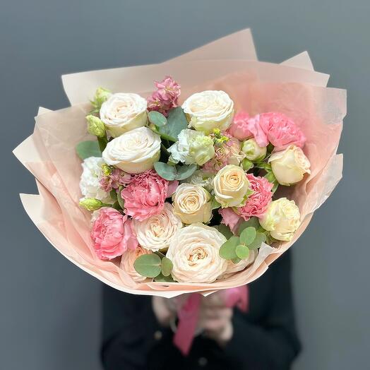 A mix of cream roses, pink carnations and mattiola