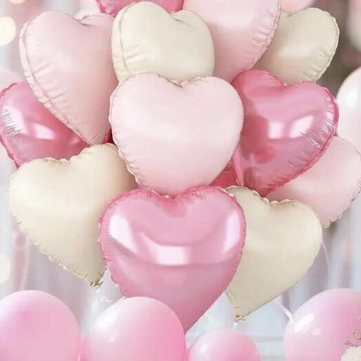 Набір рожевих і білих повітряних кульок