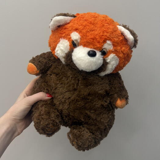 Игрушка енот
