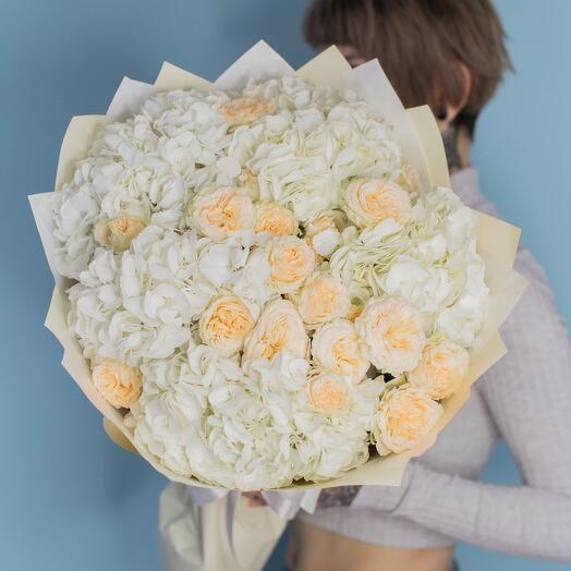 Bouquet of white Hydrangeas and bushy peony-shaped Roses