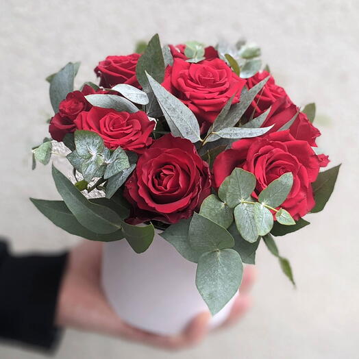 Box with roses and eucalyptus