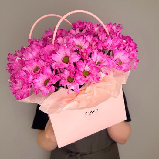 Pink daisies in a handbag