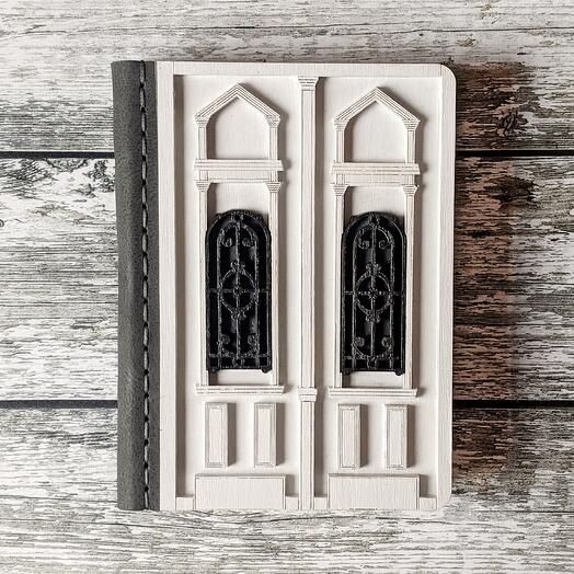 Belgrade white door journal