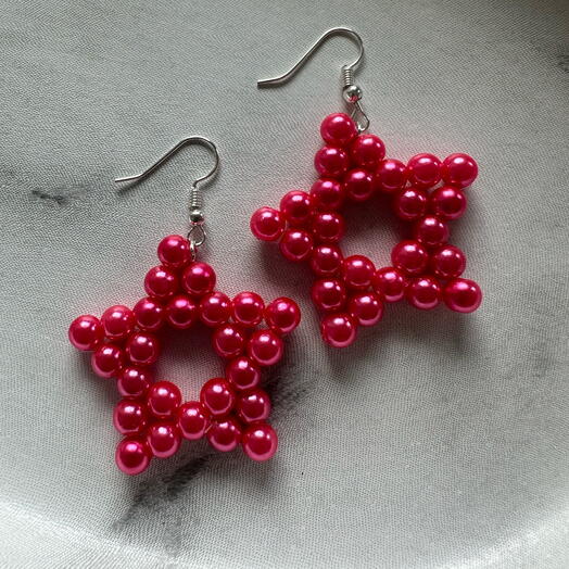 Shiny pink pearl earrings