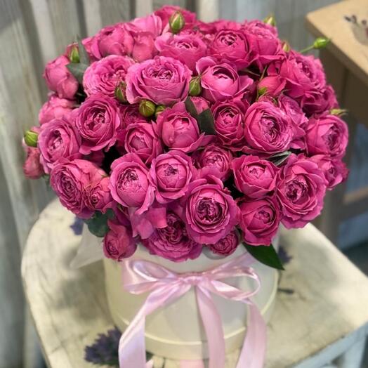 Bushy peony roses in a box