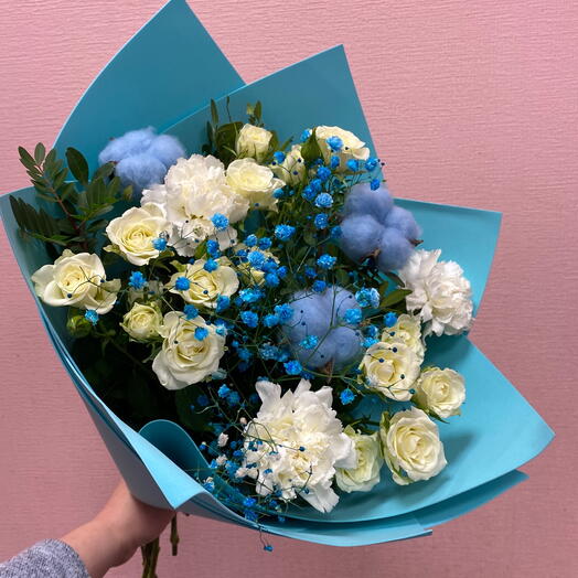 Bouquet in blue tones of bush rose with cotton