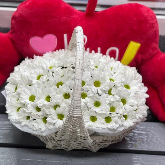 Basket with flowers and a heart