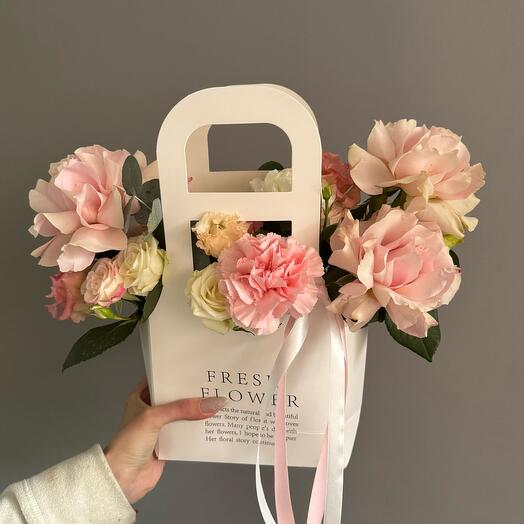 Flowers in a box. French roses.